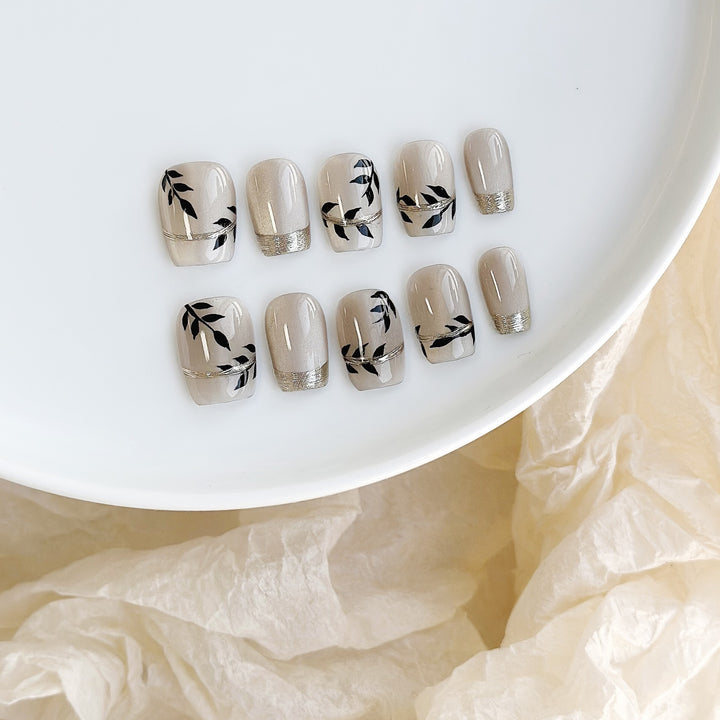 Artistic Press-On Nail Set with Floral Accents
