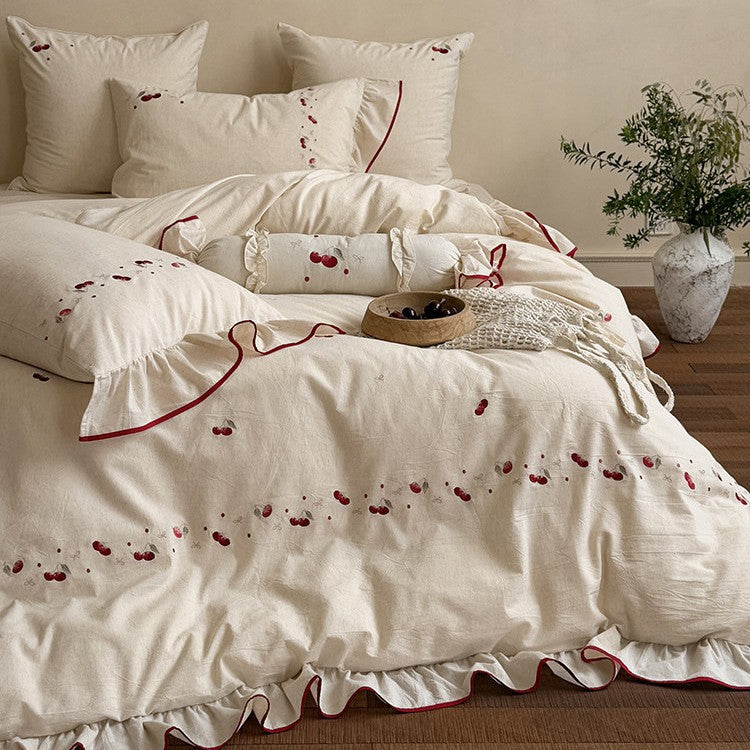 Bedding set with delicate cherry embroidery, ruffle and linen look