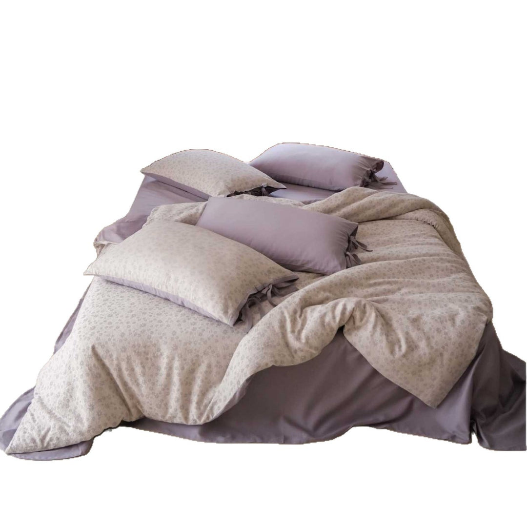 Reversible bed linen set made of cotton satin with floral print and ties