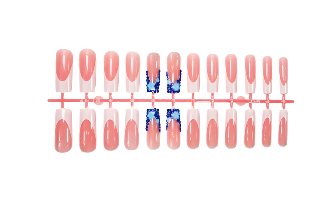 Artificial nail design with trendy blue accents and glitter coating Kalsten
