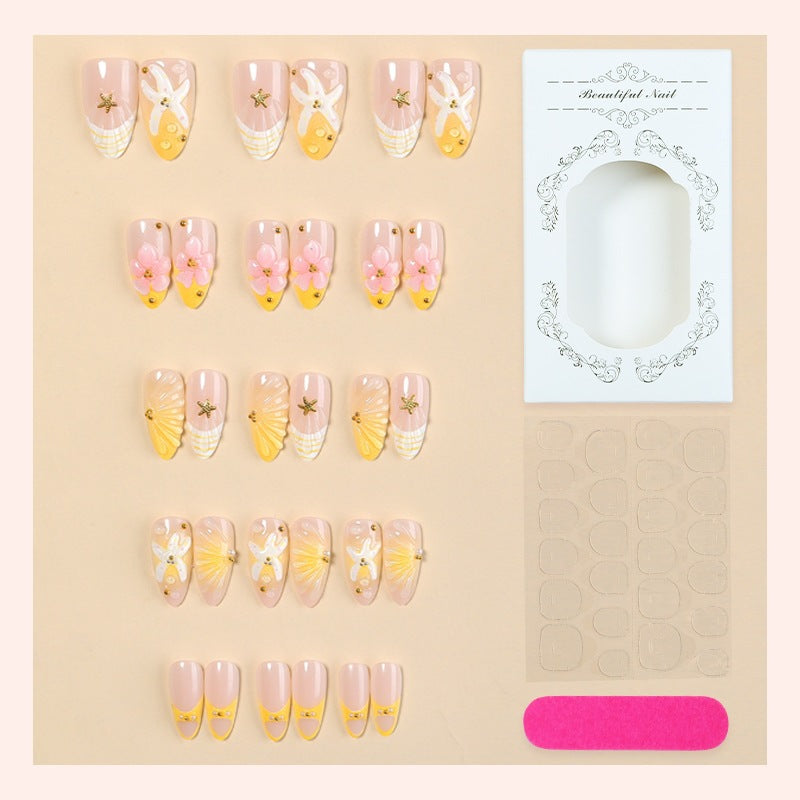 Nail art set with handmade floral accents and glitter details Kalsten
