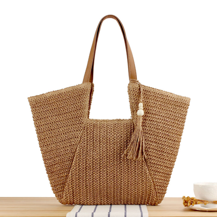 Beach bag made of natural weave with elegant leather accents Kalsten