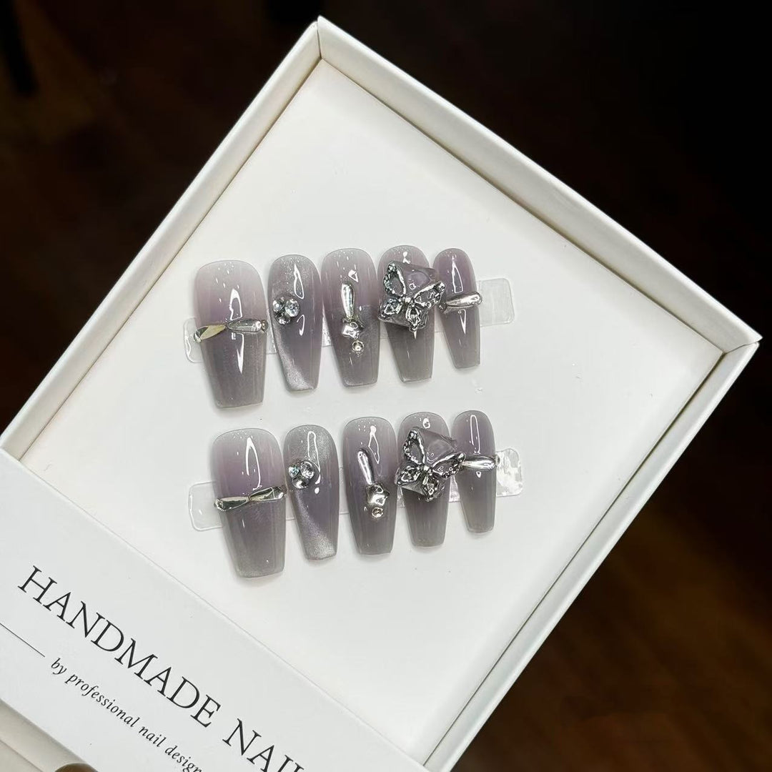 Artistic Press-On Nail Set with Decorative Accents