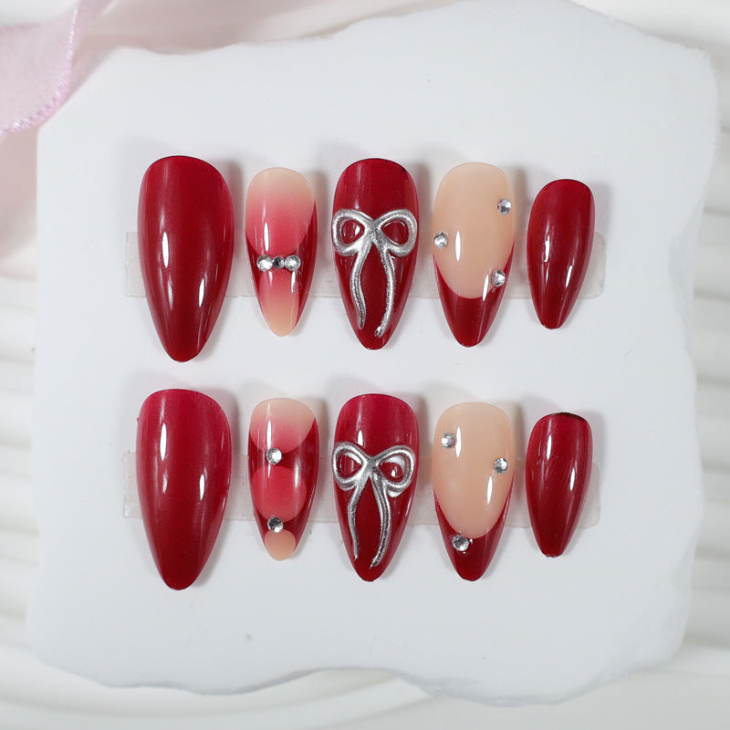 Artificial nail set with luxurious glitter and gemstone embellishments Kalsten