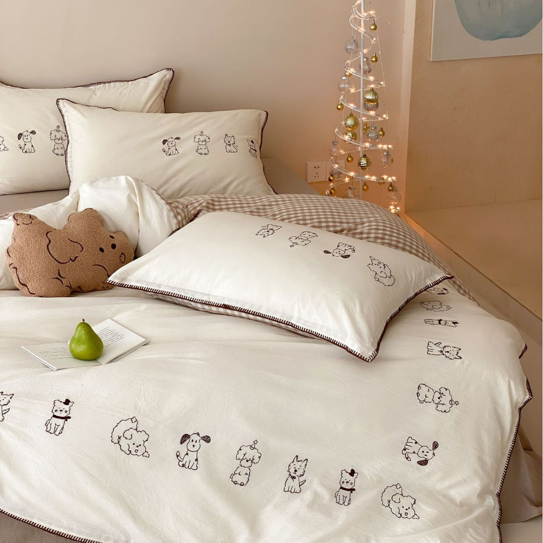 Bedding set made of cotton percale with fine embroidery and cute dog motifs