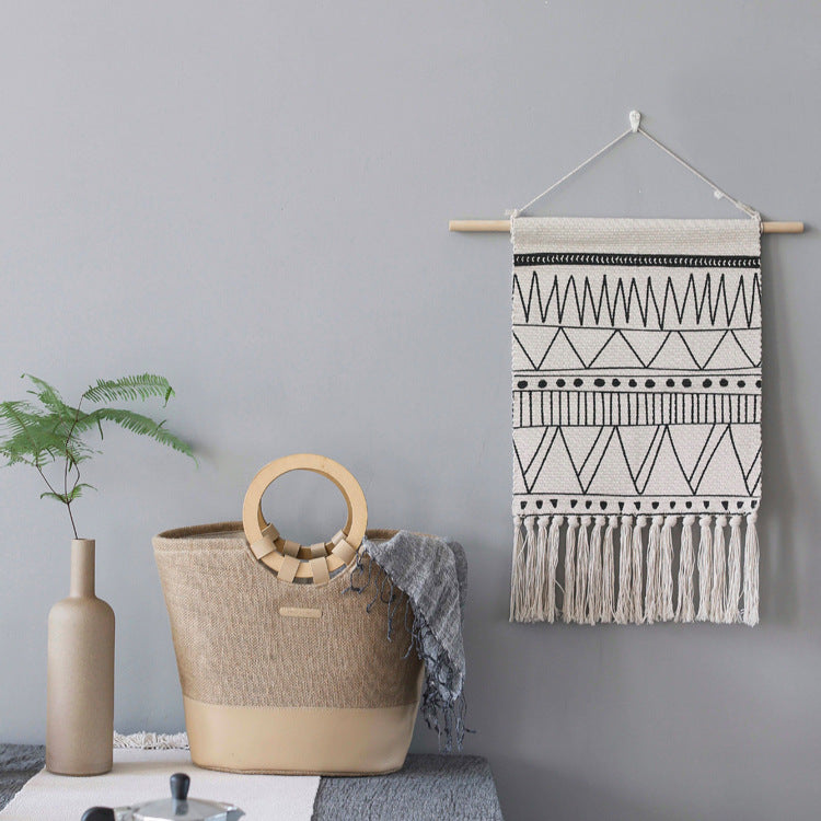 Woven Boho wall hanging with fringes and graphic ethnic pattern Kalsten