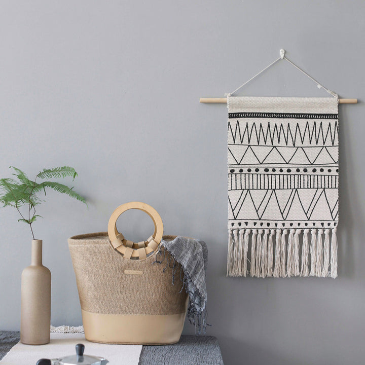 Woven Boho wall hanging with fringes and graphic ethnic pattern Kalsten