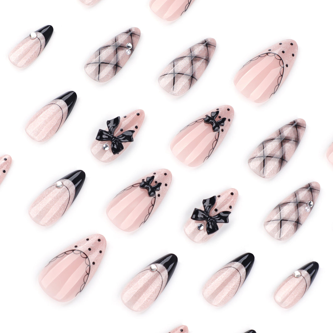 Artful Nail Art with Bow and Rhinestone Decorations Kalsten