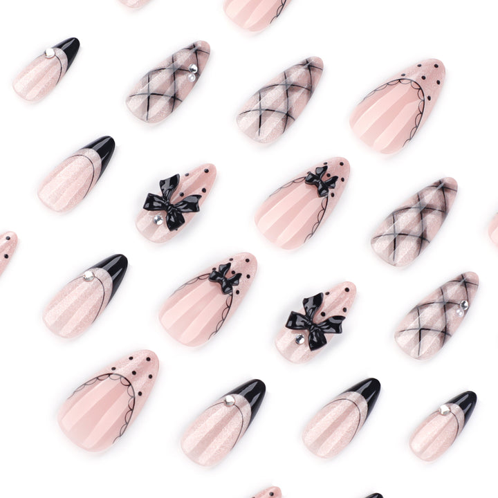 Artful Nail Art with Bow and Rhinestone Decorations Kalsten