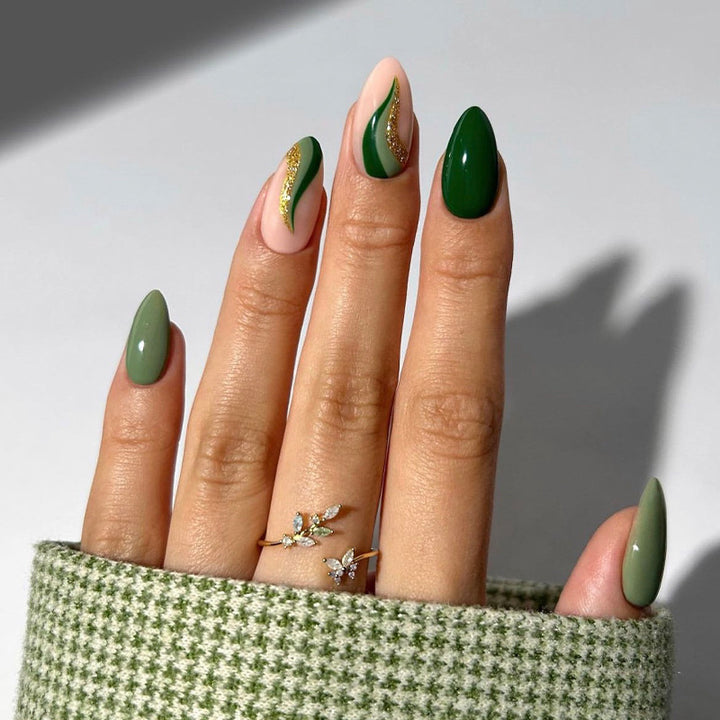 Artificial nail set with modern elegant shapes and creative golden embellishments Kalsten