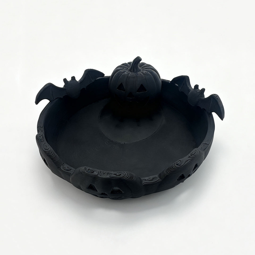 Halloween decorative bowl with carved pumpkin and bat appliqué