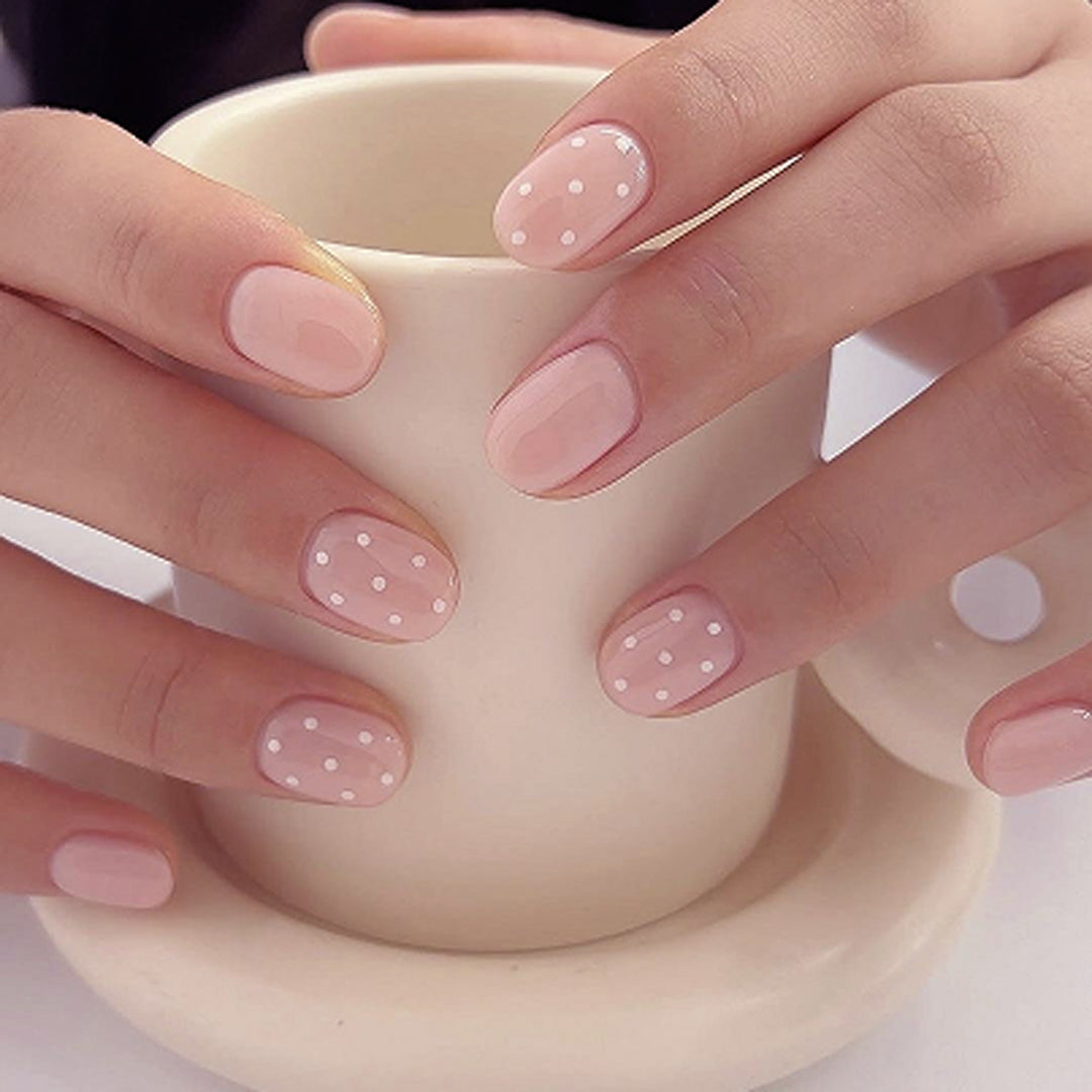 Artful stiletto nails with elegant floral design and glitter details Kalsten