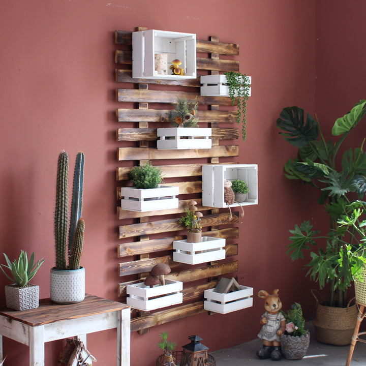 Wall shelf system with integrated storage boxes Kalsten