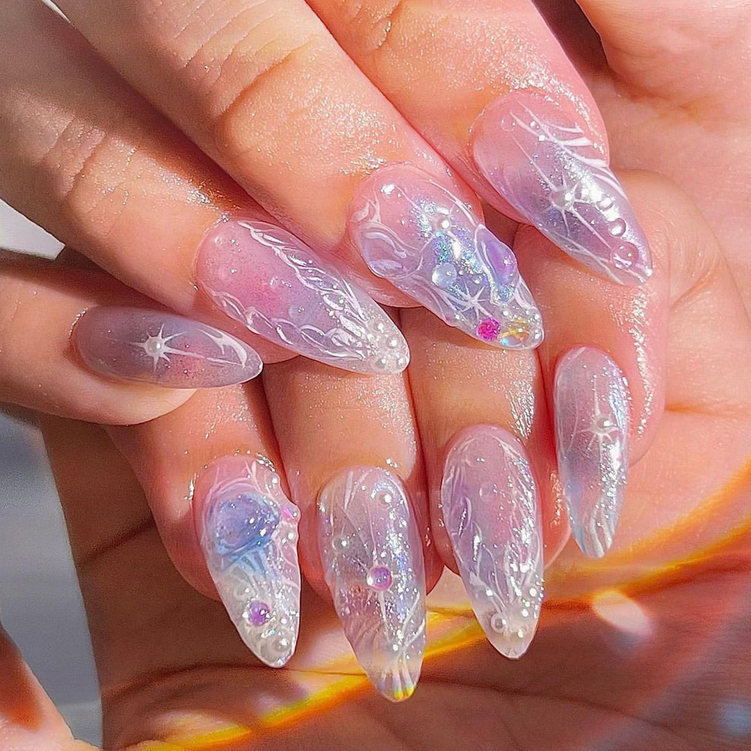 Artful nail extensions in an elegant design with gloss accents Kalsten