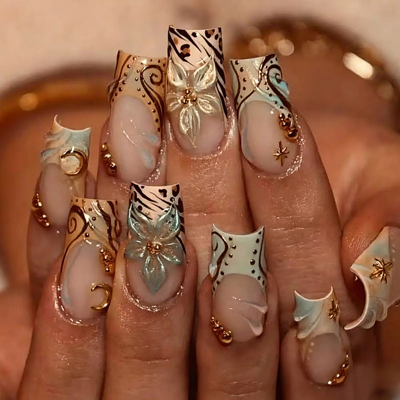Art nail set with elegant floral and geometric accents Kalsten