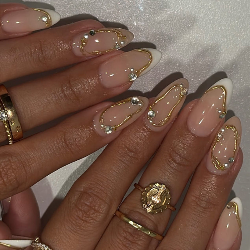 Artistic Nail Art with Elegant Gold Accents Kalsten