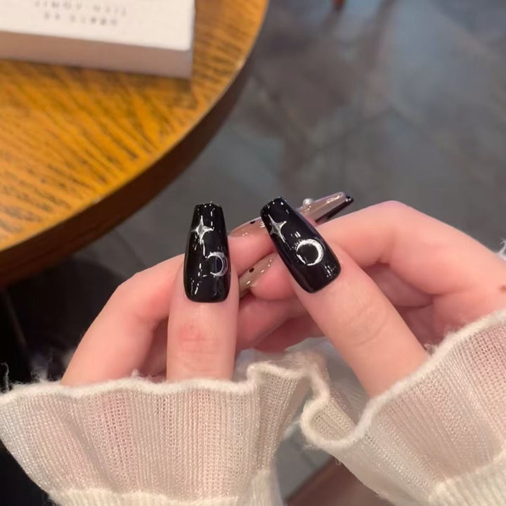 Stylish Press-On Nail Extensions with Decorative Accents