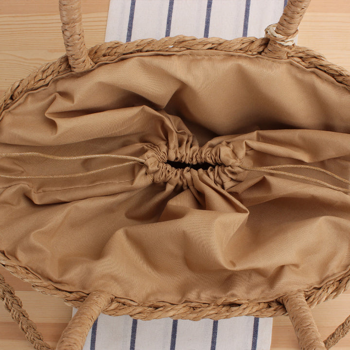 Braided crossbody bag with tassel decoration Kalsten
