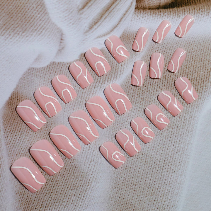 Elegant Press-On Nail Design with Artistic White Swirl Kalsten