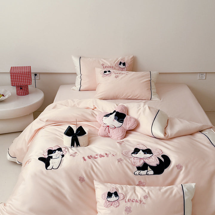 Bedding set with embroidered cat appliqués and soft cotton satin
