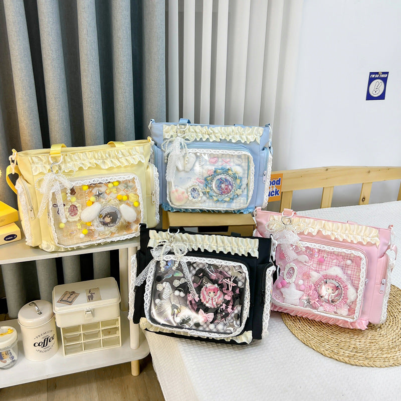Shoulder bag with transparent front and playful applications Kalsten