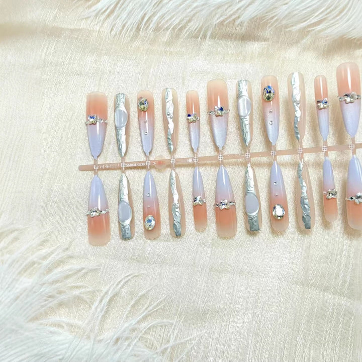 Artificial nails with elegant glitter and crystal accents Kalsten