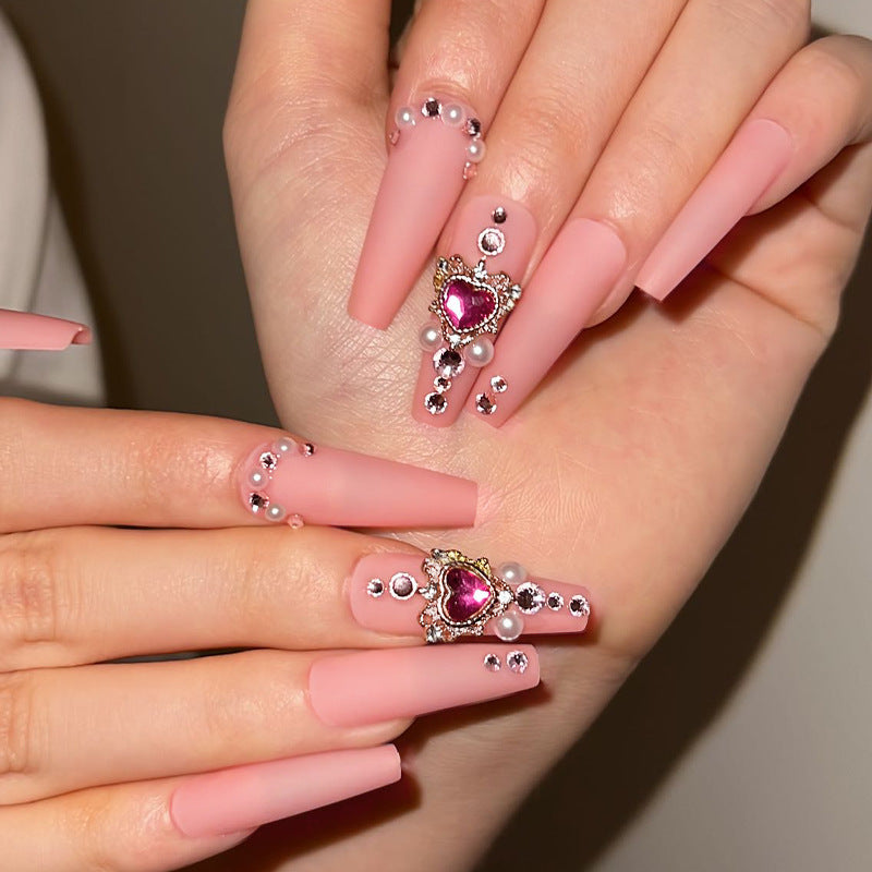 Creative artificial nails with heart-shaped decorative accents Kalsten
