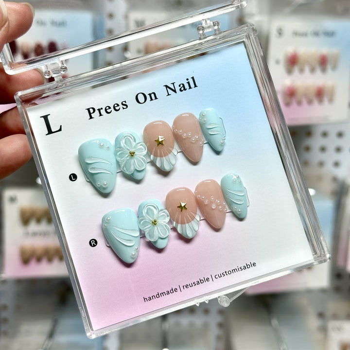Artistic Press-On Nail Set with Floral and Green Accents
