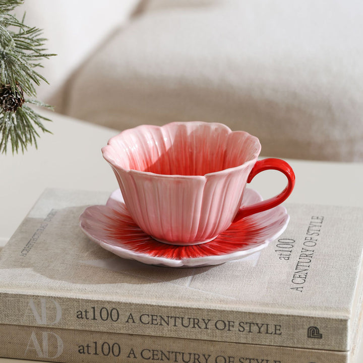 Ceramic mug with saucer in flower shape