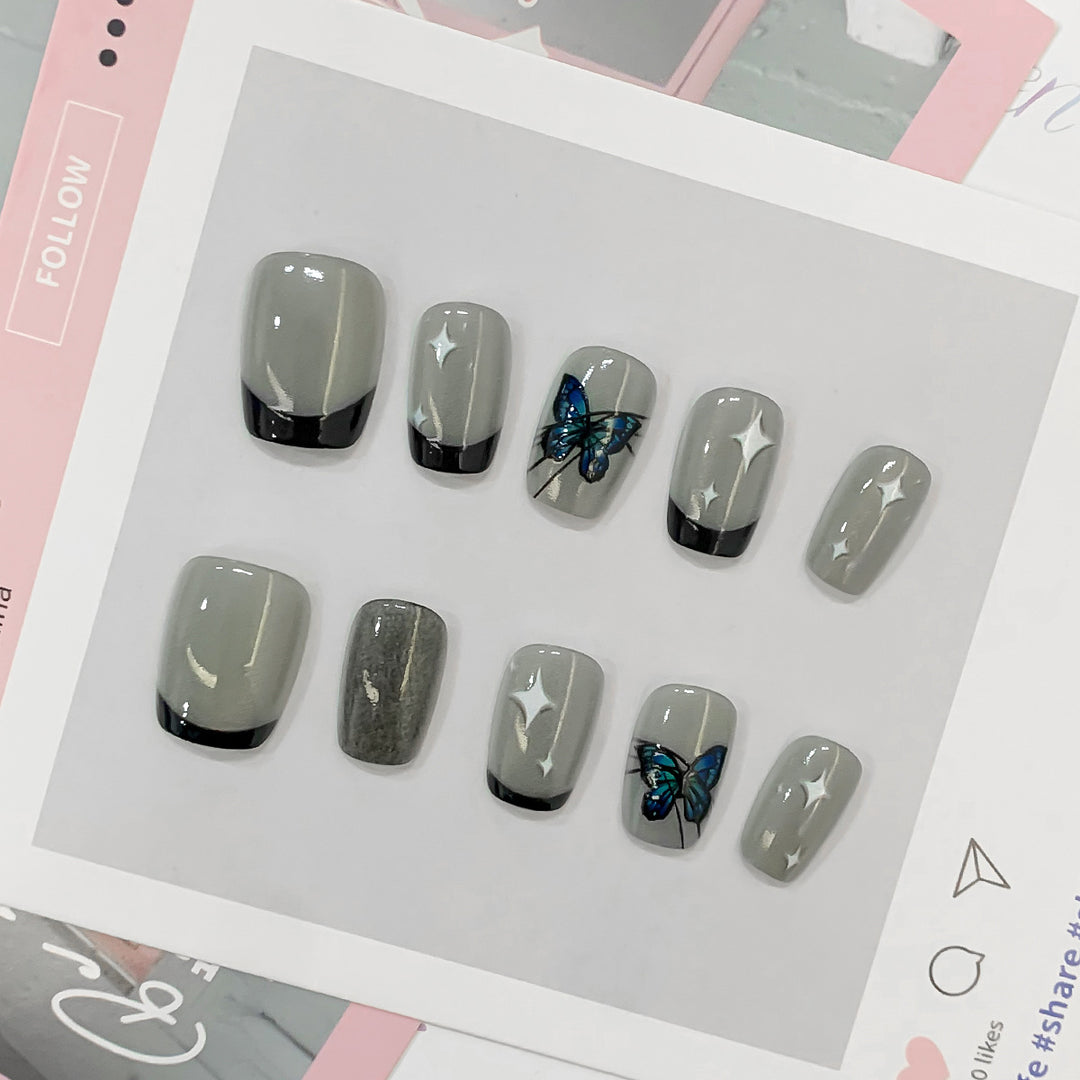 Artistic nail tips with butterfly designs Kalsten
