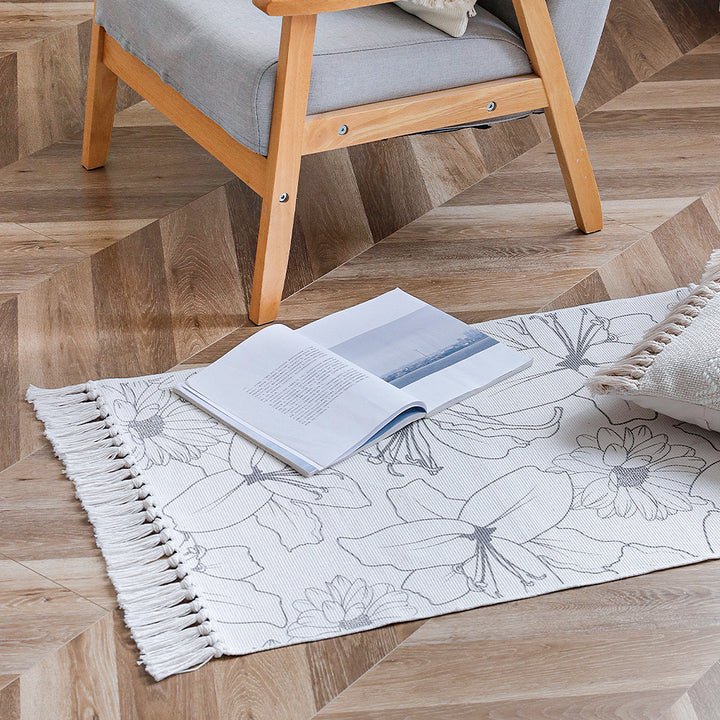 Decorative table runner made of cotton with botanical bird print and fringes Kalsten