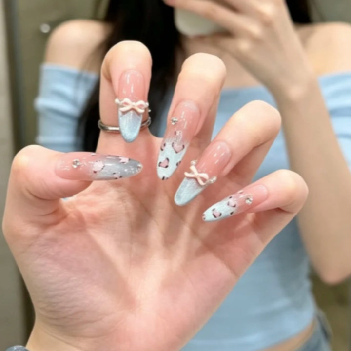 Artistic Glittered Stiletto Nail Enhancements