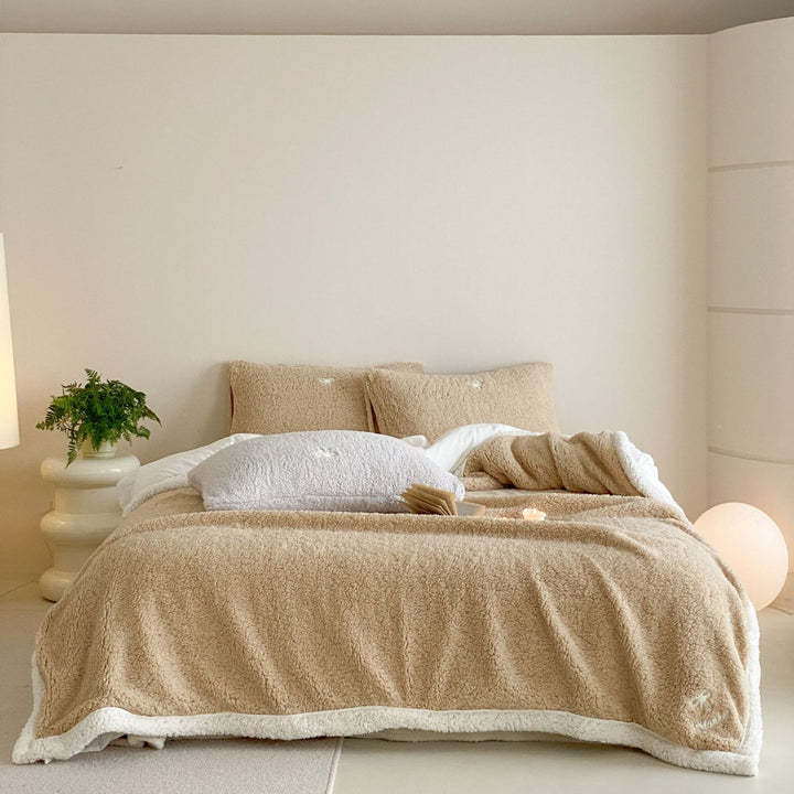 Cozy Sherpa blanket with reversible fleece lining
