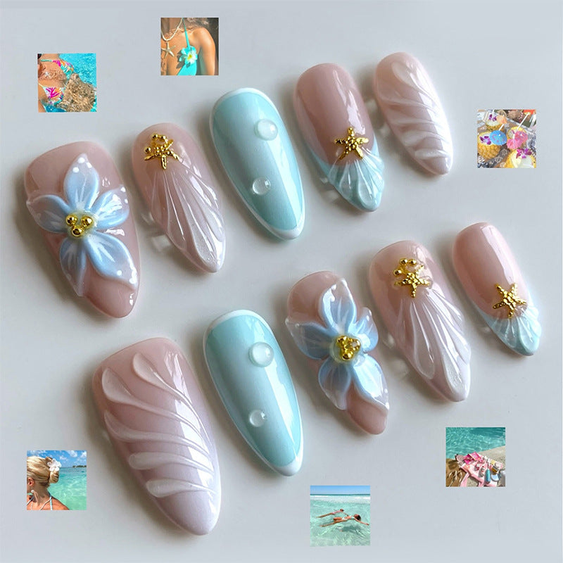 Artificial nail set with floral design and artistic embellishments Kalsten