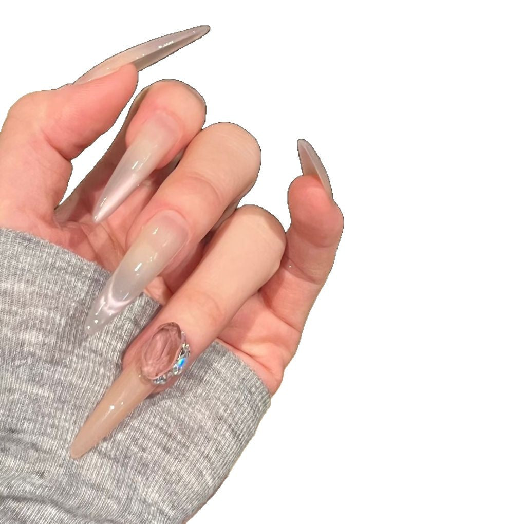 Glamorous Stiletto Nail Art Extensions with Decorative Accents