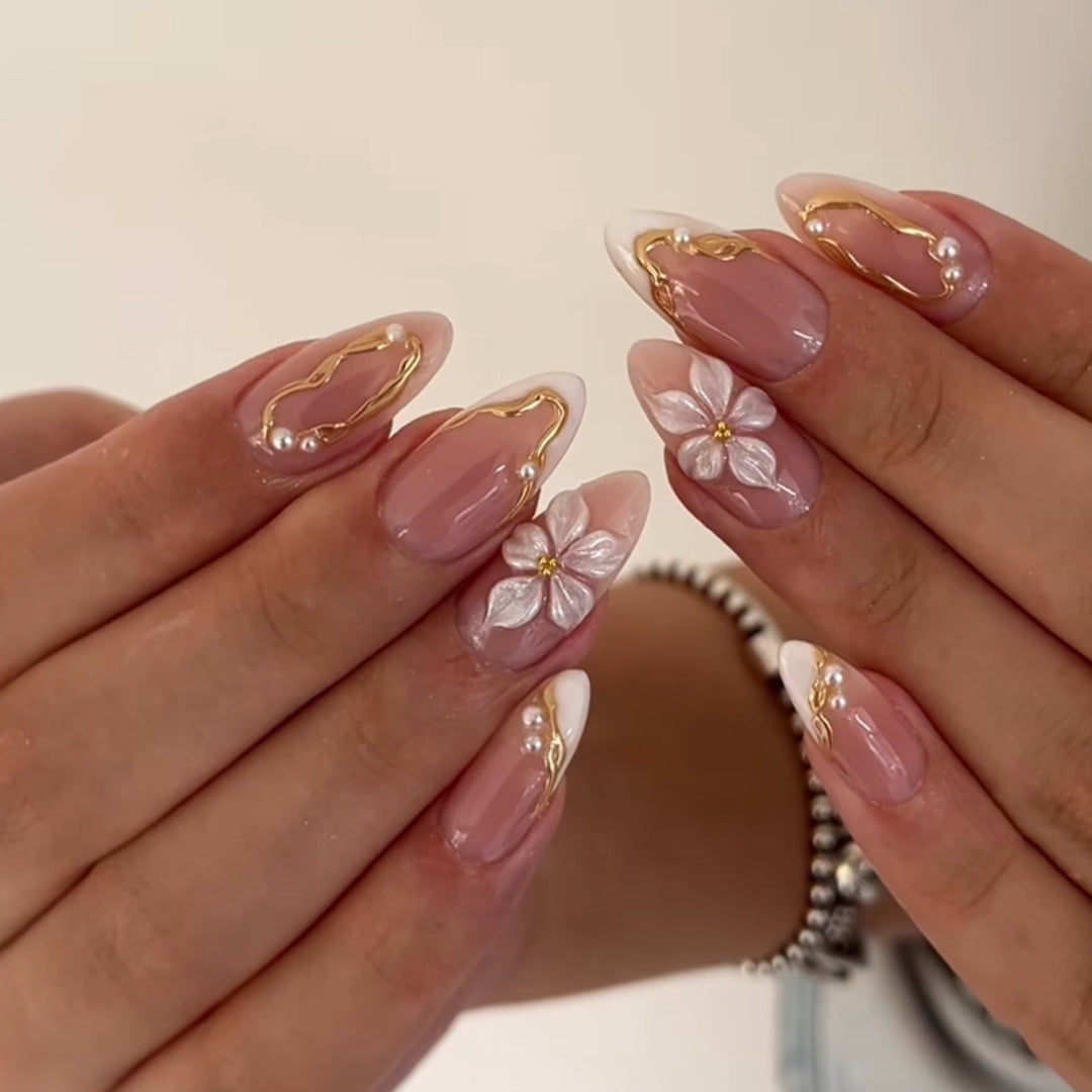 Artful acrylic nails with elegant floral accents Kalsten