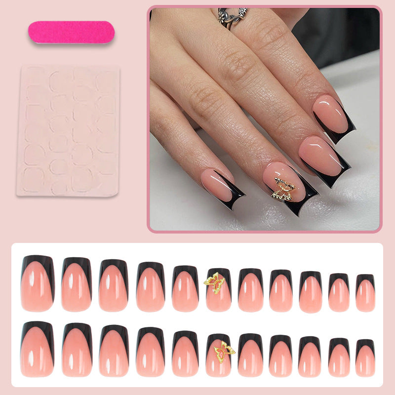 Artificial nails with elegant black and white tips and delicate accents Kalsten