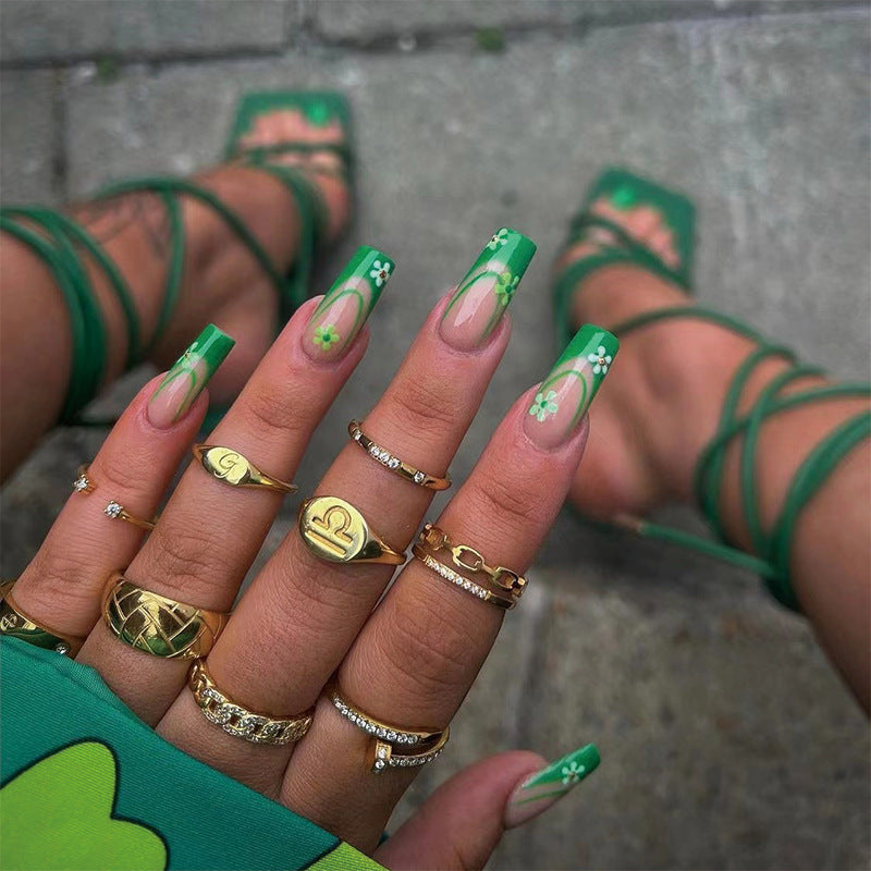 Artful nail art with floral accents and elegant design Kalsten
