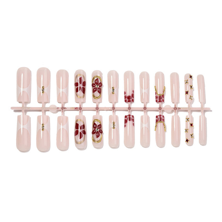 Artificial nail set with floral decorations and elegant accents Kalsten