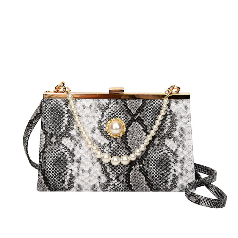 Elegant Pearl-Embellished Snakeskin Clutch Bag