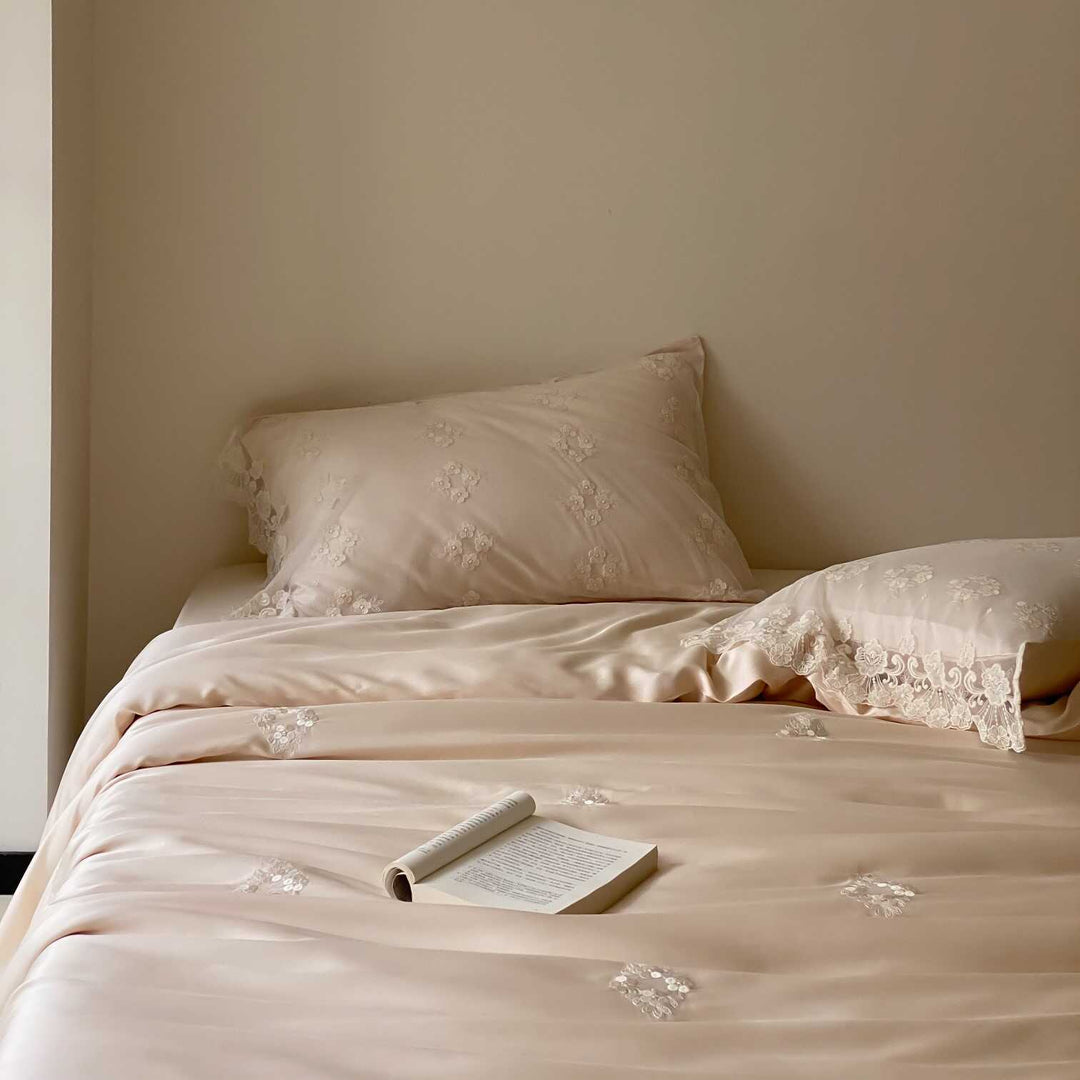Satin bed linen set with lace trim, floral embroidery & silky touch