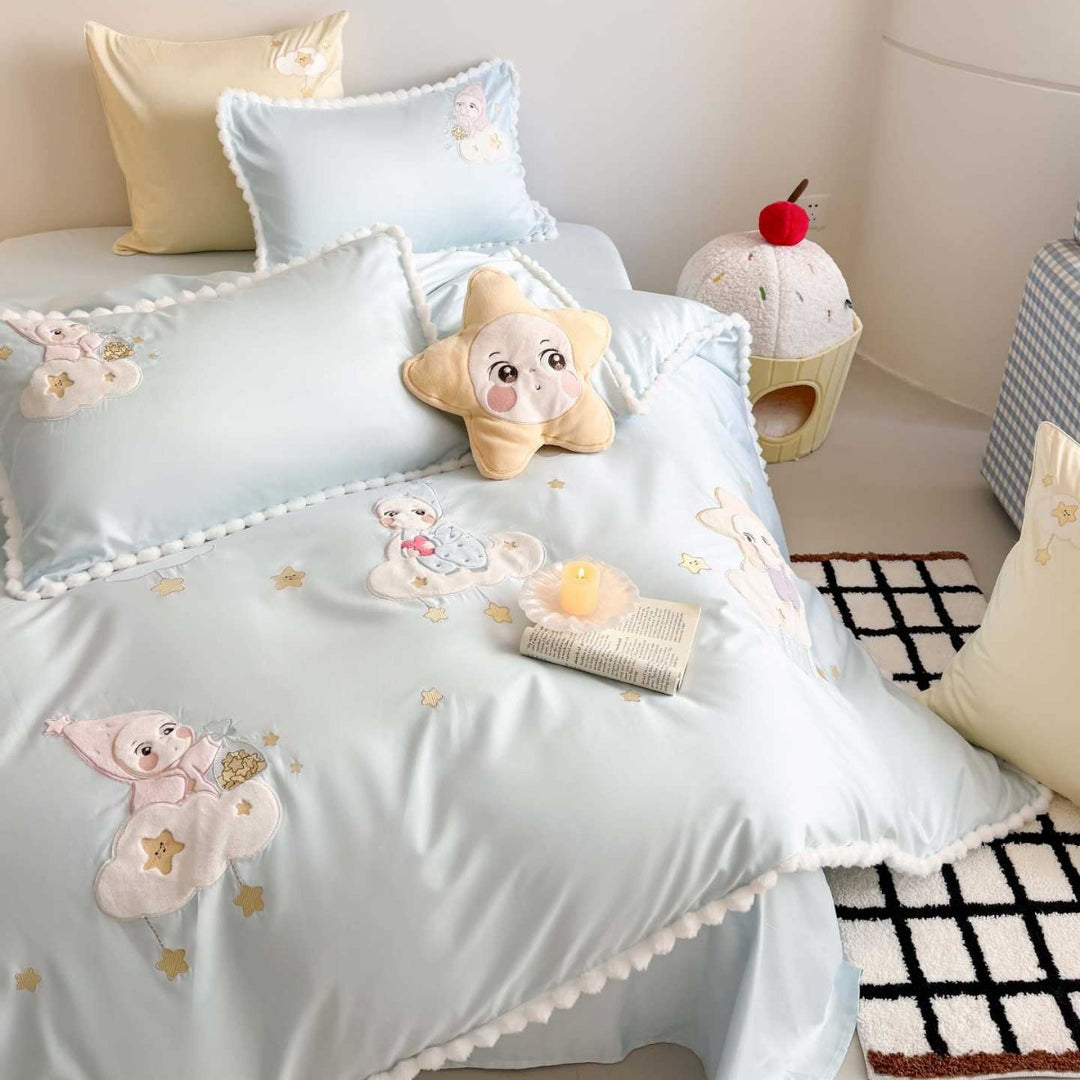 Bedding set for children with stitched cloud and star appliqués