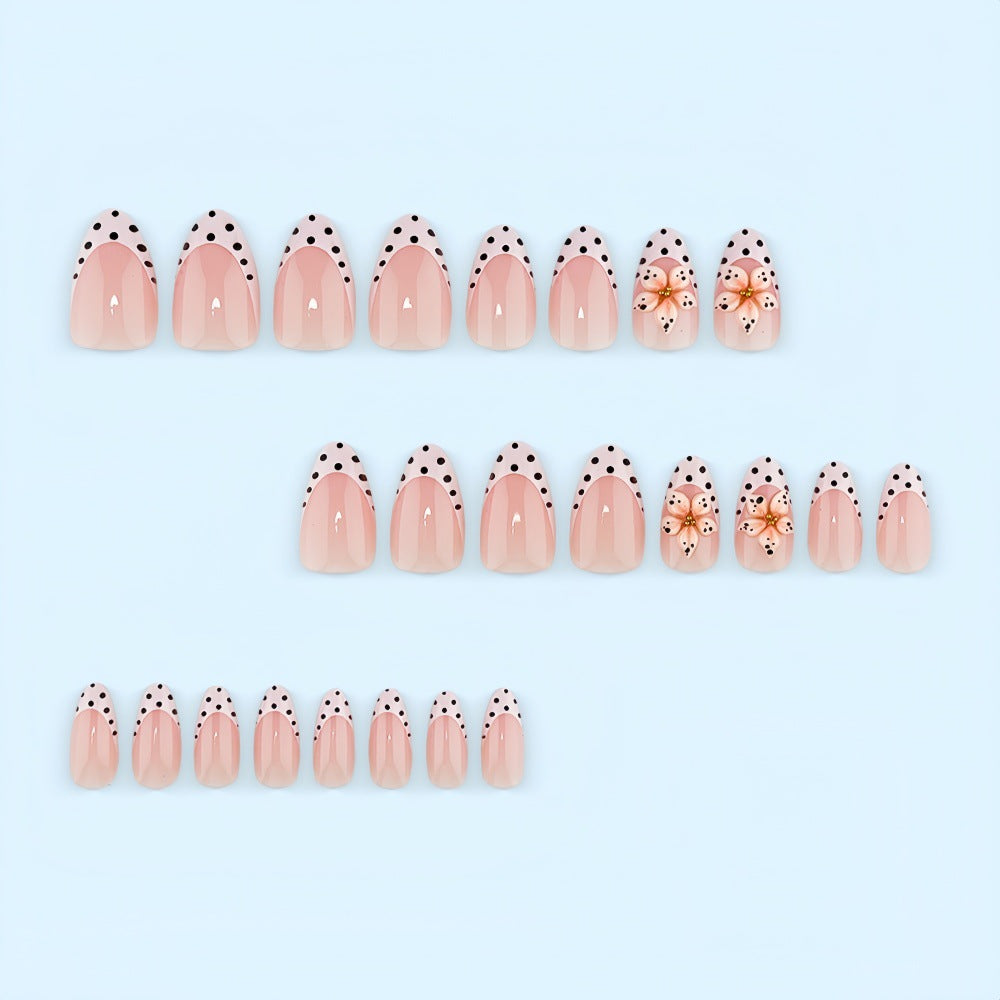 Creative artificial nails with floral design and glamorous accents Kalsten