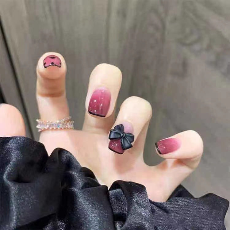 Themed Press-On Nail Set with Decorative Heart and Bow Designs