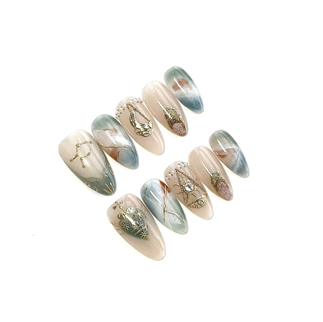 Artistic Press-On Nail Art Set with Celestial and Gem Accents