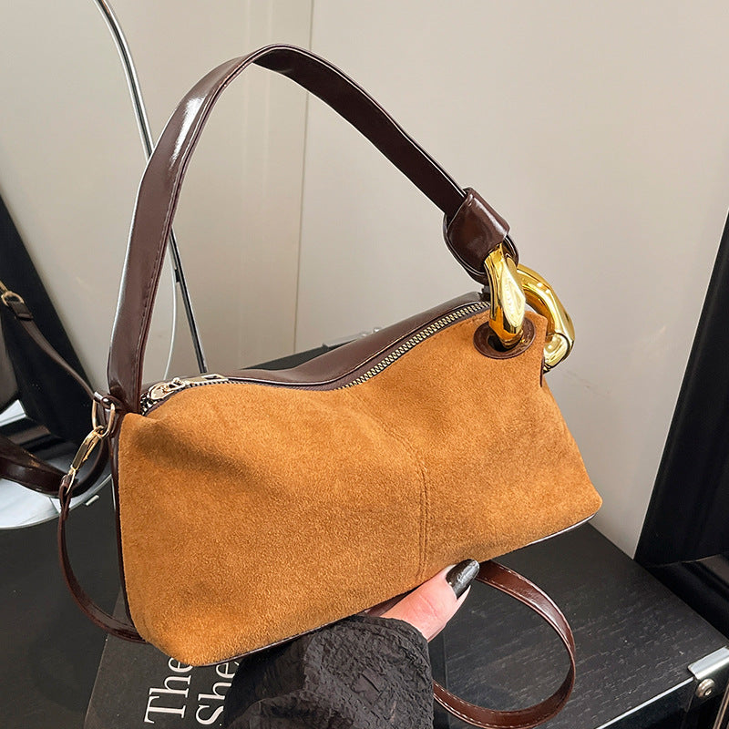 Elegant Suede Handbag with Gold Accents