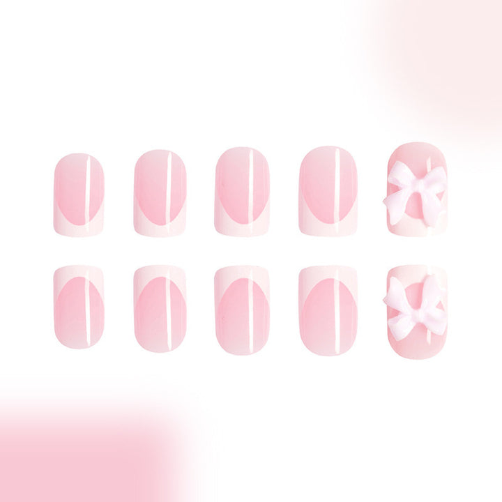 Acrylic nail set with playful bow design Kalsten