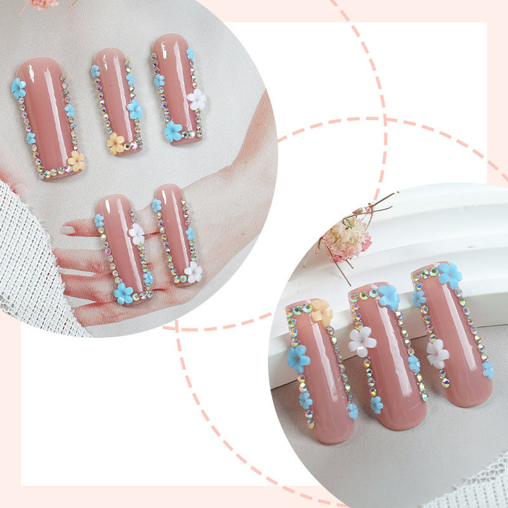 Artificial nail set with shimmering flower and glitter decorations Kalsten