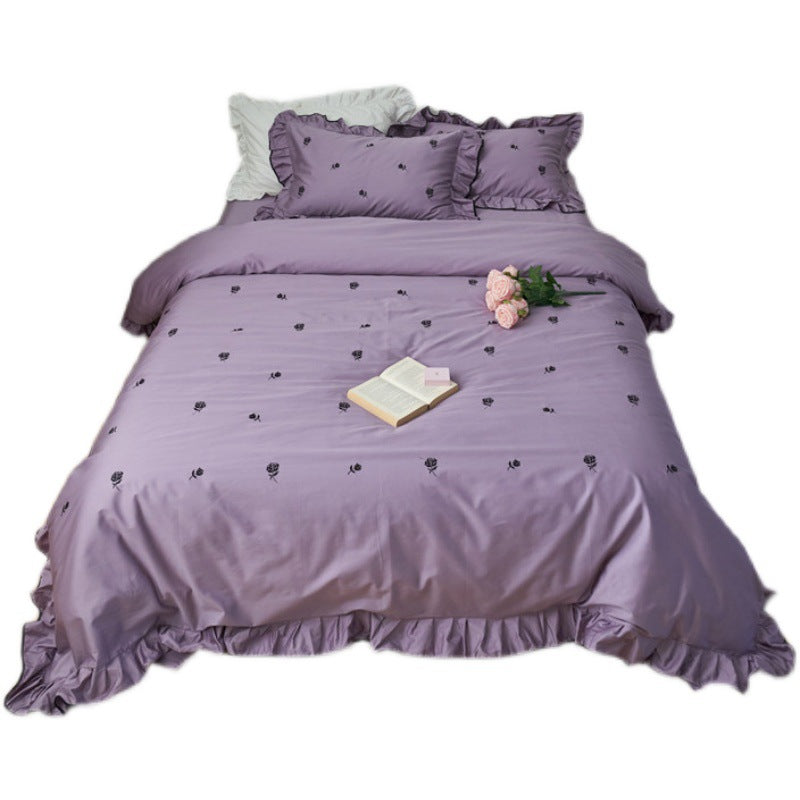 Bedding set with embroidered roses, ruffle details and extra soft cotton satin