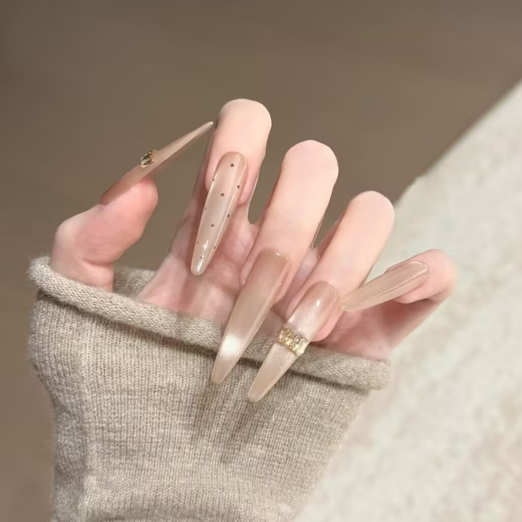 Artistic Nail Design with Decorative Elements Kalsten